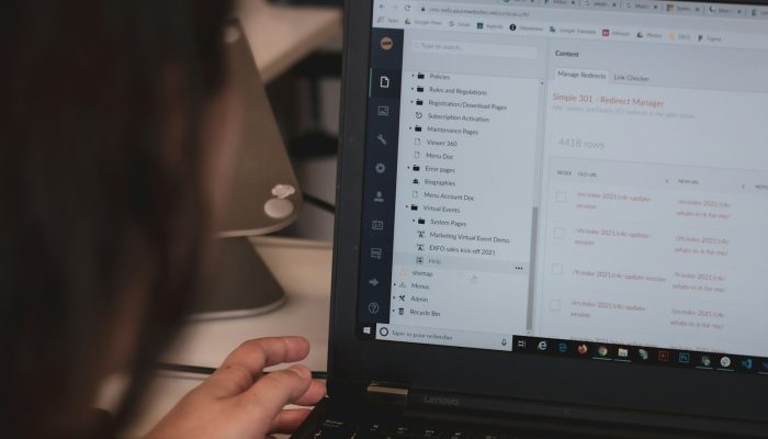 person using black laptop computer