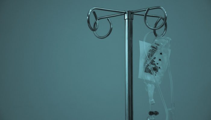 dextrose hanging on stainless steel IV stand